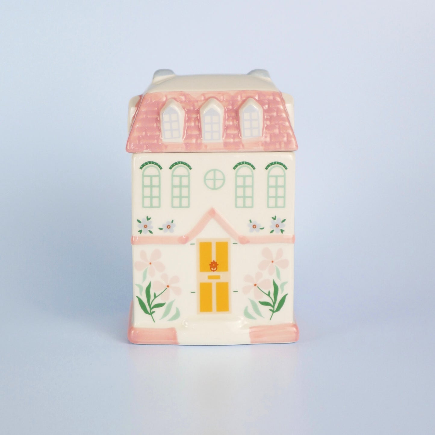 A pastel townhouse wax melt burner