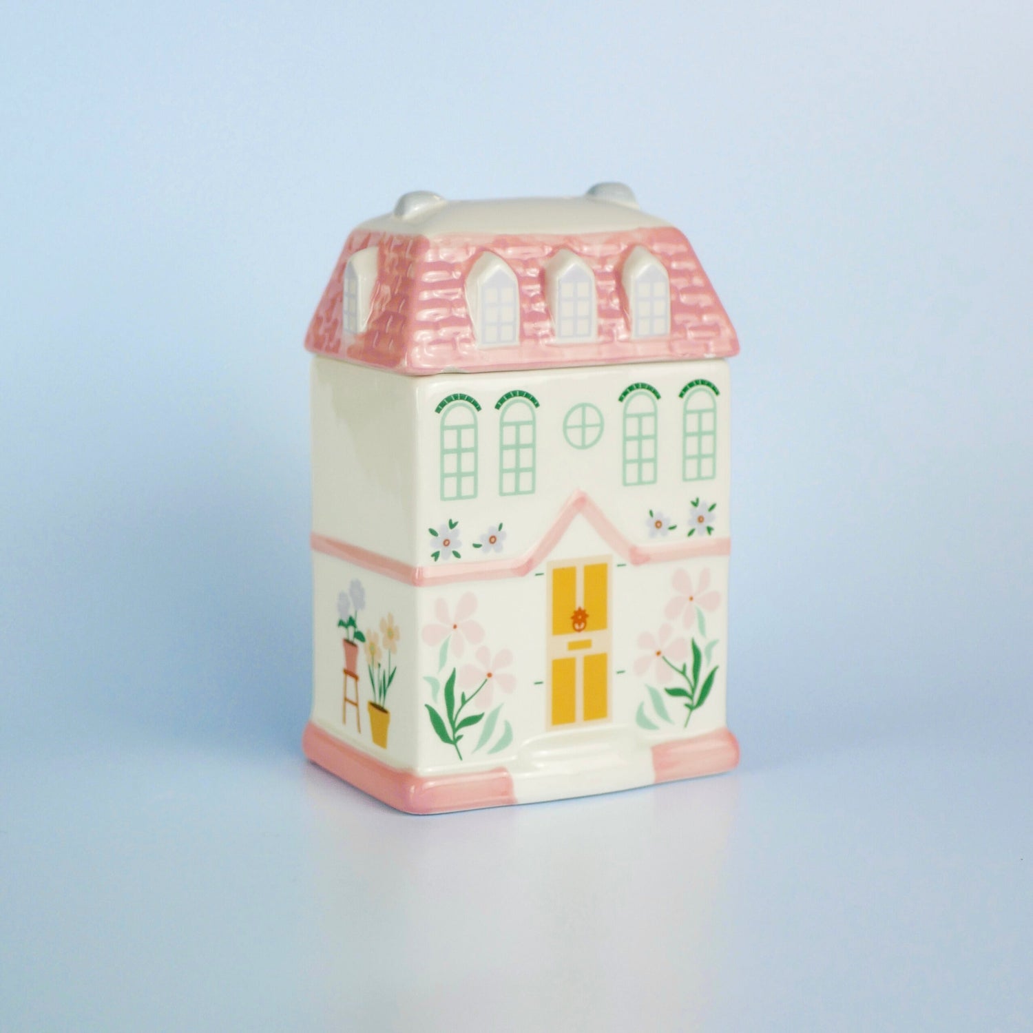 A pastel townhouse wax melt burner