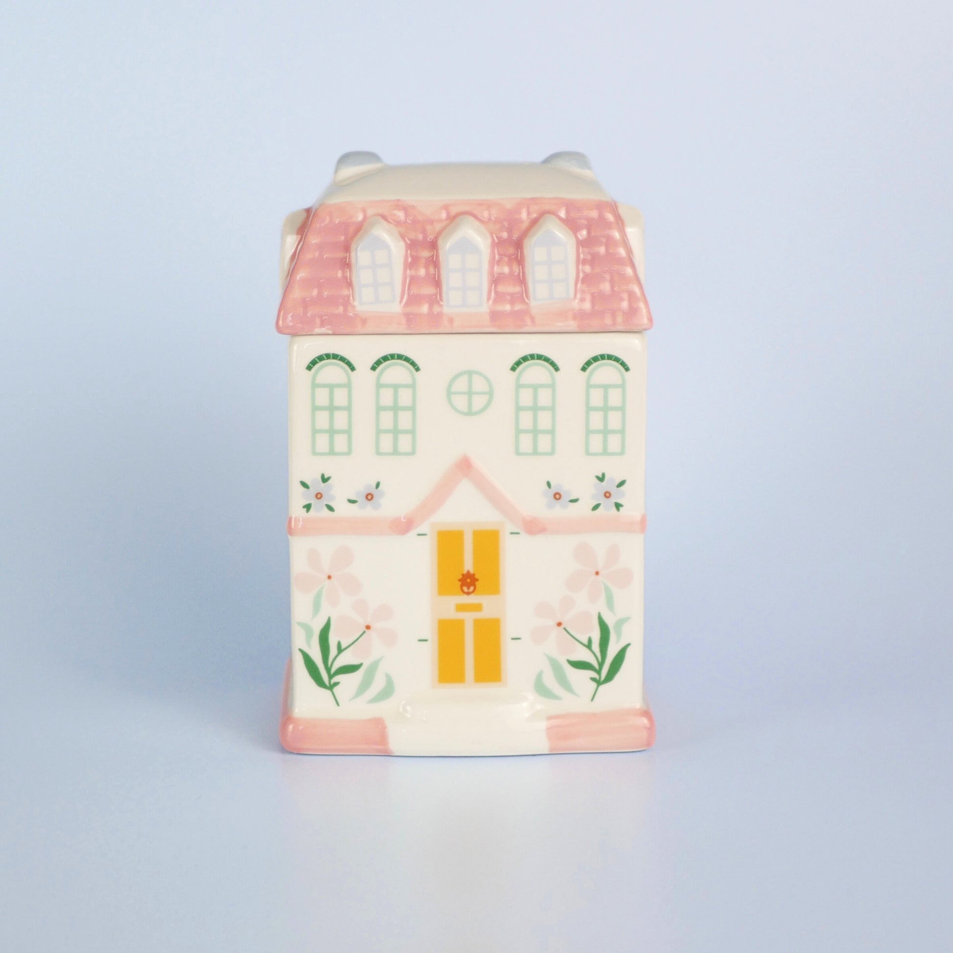 A pastel townhouse wax melt burner